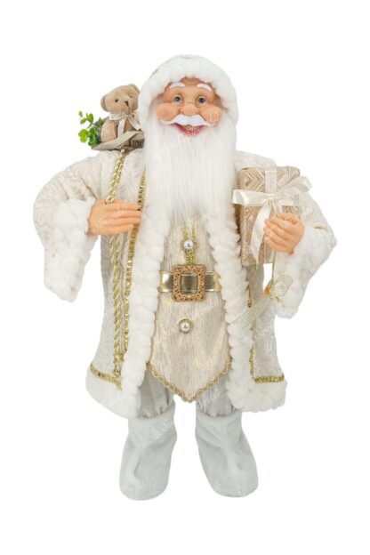 Vánoční dekorace Mikuláš Bílý 80cm má na sobě bílý kabát se zlatým vzorem a lemováním a zlatý pásek. Na nohou má bílé boty a v ruce drží dárek. Má husté dlouhé bílé vousy a brýle.